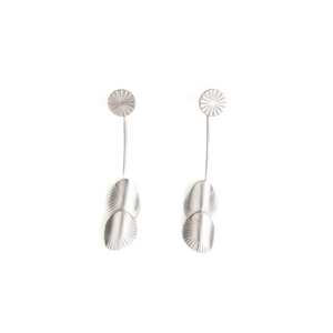 Pair of silver earrings on a white background