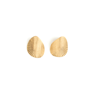 Pair of gold teardrop-shaped earrings on a white background
